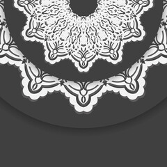 The brochure in black with a luxurious white pattern is ready for printing.