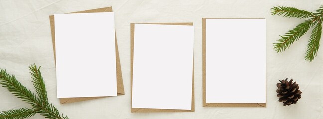 Horizontal Christmas banner with 3 greeting cards mockups and brown envelopes, cover for social...