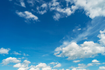 Naklejka na ściany i meble Blue sky and white clouds. fluffy cloud in the blue sky background