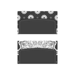 Black business card with vintage white ornament for your contacts.