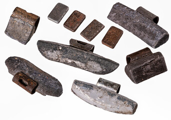 Old worn out lead weights for car wheels. 