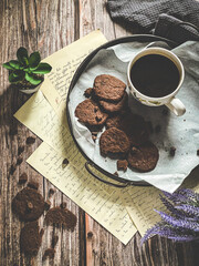 Chocolate and a cup of coffee. Vintage and rustic style