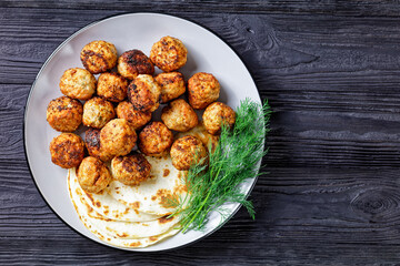 Keftedakia, fried greek meatballs on a plate