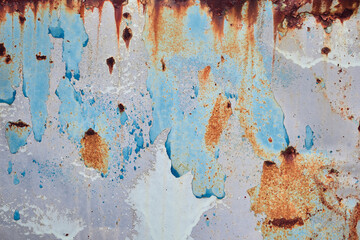 An old rusty metal wall. Beautiful texture for the background.