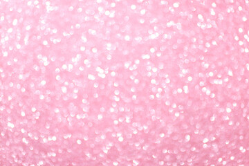 Defocused pink silver, pink rose bokeh,circle abstract light background, shining lights, sparkling glittering Valentines, women day,event lights romantic backdrop.Blurred abstract holiday background.