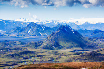 Beautiful Icelandic landscape with mountains, lake, sky and clouds. Trekking in national park...