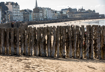 Big breakwater and beach in Saint Malo, 3000 trunks to defend the city from the tides,...