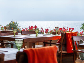 Sochi, Russia, October 18, 2021. Picturesque embankment. People have rest and eating in cafe at the seashore