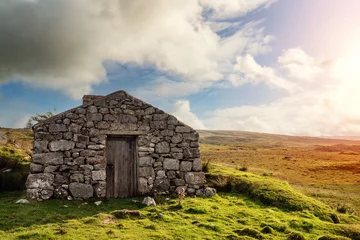 Foto op Canvas Old abandoned stone house without the roof. Sunset time. Rural Irish farm building. Dramatic sky. Old architecture example. Top quality frame . History and heritage concept. Connemara, Ireland © mark_gusev