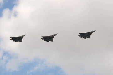 Russian multi-purpose fighters of the fifth generation Su-57 in the sky over Moscow's Red Square during the dress rehearsal of the Victory Air Parade