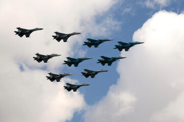 A tactical wing consisting of a group of SU-34, SU-30SM and SU-35 fighters in the sky over Moscow's Red Square during the dress rehearsal of the Victory Air Parade