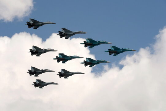 A tactical wing consisting of a group of SU-34, SU-30SM and SU-35 fighters in the sky over Moscow's Red Square during the dress rehearsal of the Victory Air Parade