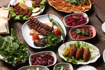 adana kebab and salad varieties