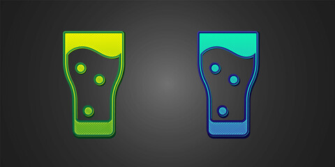 Green and blue Glass of beer icon isolated on black background. Vector