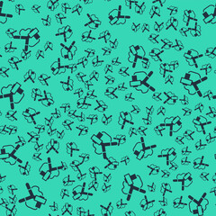 Black Slingshot icon isolated seamless pattern on green background. Vector