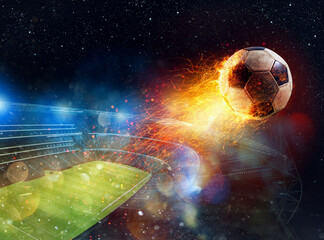 Powerful fiery soccer ball comes out of a stadium