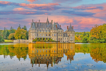 Fototapeta na wymiar Historic Castle in France by a Lake