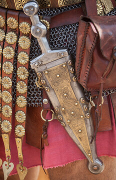 Centurion girding a pugio, a dagger used by roman soldiers as a sidearm