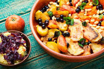 Autumn dessert with baked fruits and grilled cheese