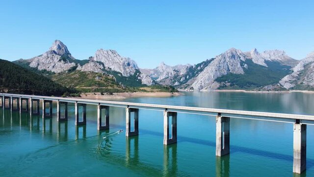 Drone Capture in Rotation on the Ria&ntilde;o Bridge and the Mountains Fund in Spain.