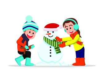 Boy and little girl are making a snowman together