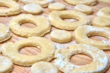 Blank for making curd donuts in the form of rings and balls. Home cooking, dough products