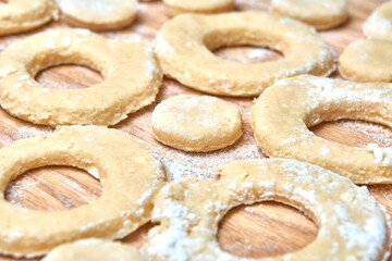 Blank for making curd donuts in the form of rings and balls. Home cooking, dough products