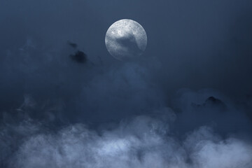 Full moon with dark cloudscapes on the night