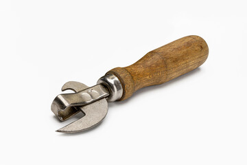 An old can opener with a wooden handle - a time-tested solution to problems