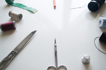 Sewing embroidery and sewing supplies on a white background