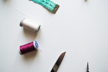 Sewing embroidery and sewing supplies on a white background