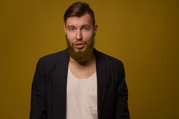 Obraz premium bearded man fashionable hairstyle jacket posing self confidence