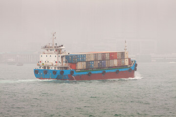 Container Ship on Victoria Harbour in Fog