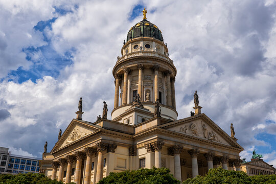 Germany, Berlin,Neue Kirche standing against clouds