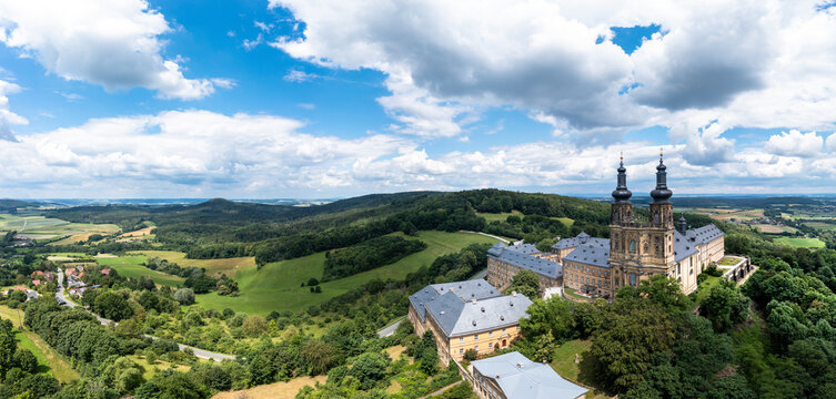 Germany, Bavaria, Bad Staffelstein, Aerial panorama ofBanz Abbey and surrounding landscape in summer