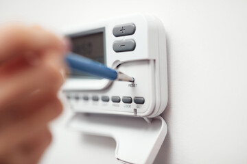 Restarting central heating digital programmer for average domestic house in Europe and more.