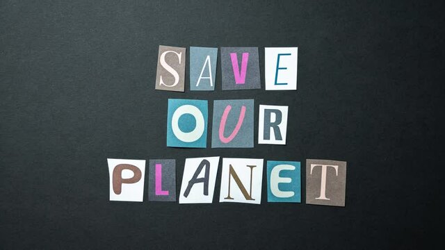 Save our planet words. Caption, heading made of letters with different fonts on a dark background.