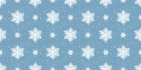 Winter snowflakes pattern background. Blue seamless snowflake pattern. Perfect for fabric, wallpaper, background, wrapping paper, craft, texture, book cover and others.