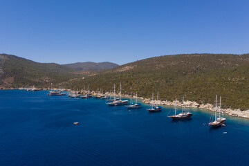 Fototapeta na wymiar Group of sailboats in mediterranean coast.