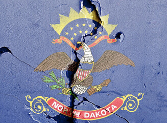 Flag of North Dakota on cracked wall