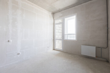 interior of the apartment without decoration in gray colors
