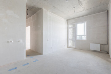 interior of the apartment without decoration in gray colors