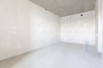 interior of the apartment without decoration in gray colors