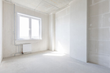 interior of the apartment without decoration in gray colors