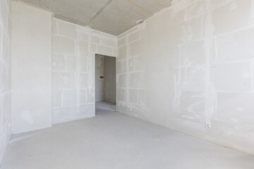 interior of the apartment without decoration in gray colors