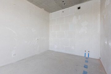 interior of the apartment without decoration in gray colors