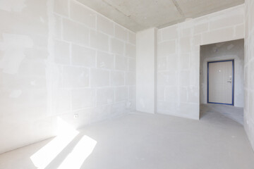 interior of the apartment without decoration in gray colors