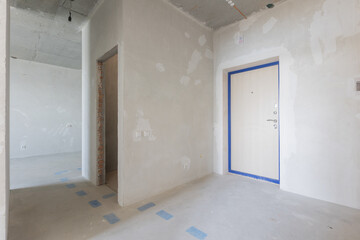 interior of the apartment without decoration in gray colors