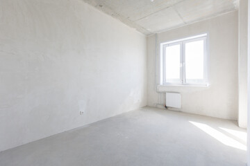 interior of the apartment without decoration in gray colors