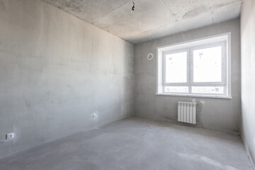 interior of the apartment without decoration in gray colors